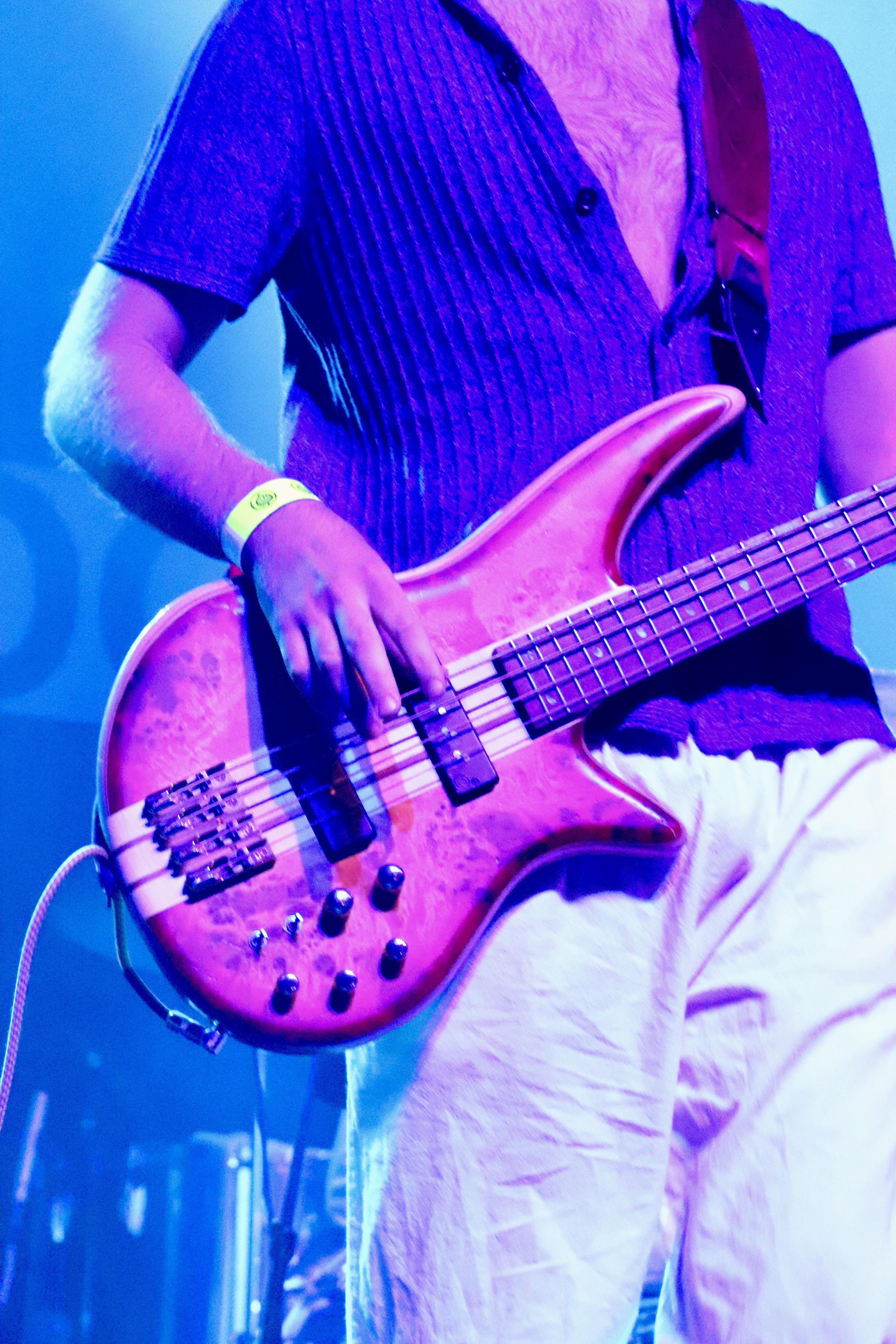 Bass guitar close up blue light